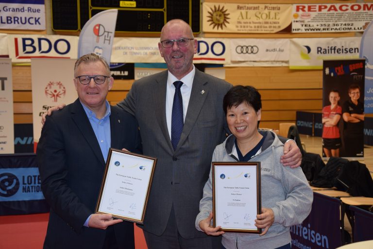 President KRAMER presented Badge of Honour to André HARTMANN and NI Xia Lian